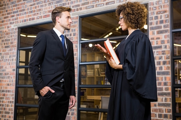 lawyer interacting with businessman office 107420 12569